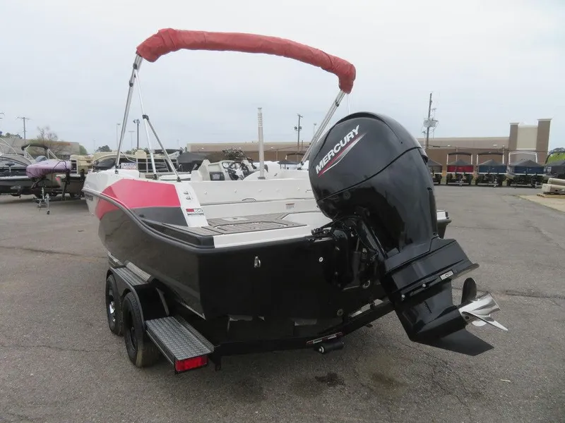 Slide: The Image of 2022 Starcraft SVX211 OB boat with Mercury outboard motor and red canopy. - 5