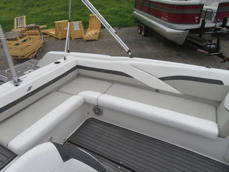 Slide: The Image of 2022 Starcraft SVX211 OB boat with white and gray seating area. - 7