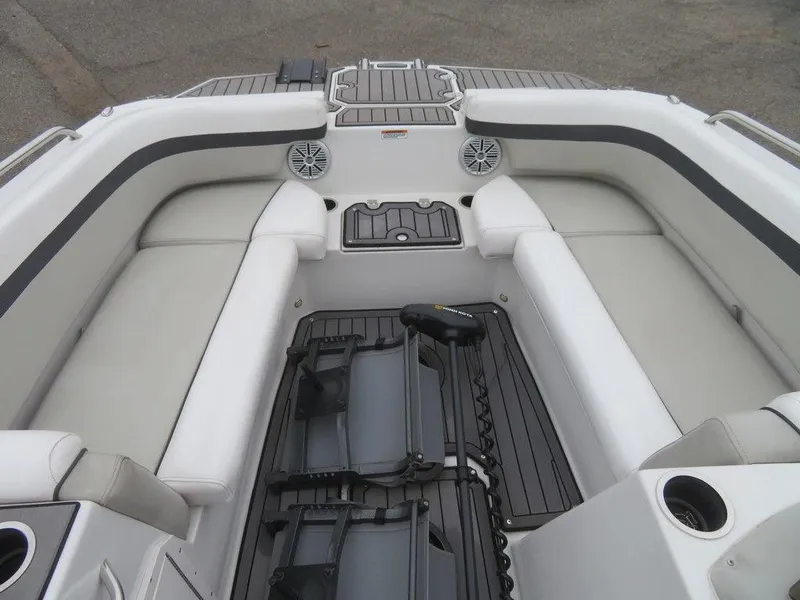 Slide: The Image of 2022 Starcraft SVX211 OB boat interior with white seating and black accents. - 8