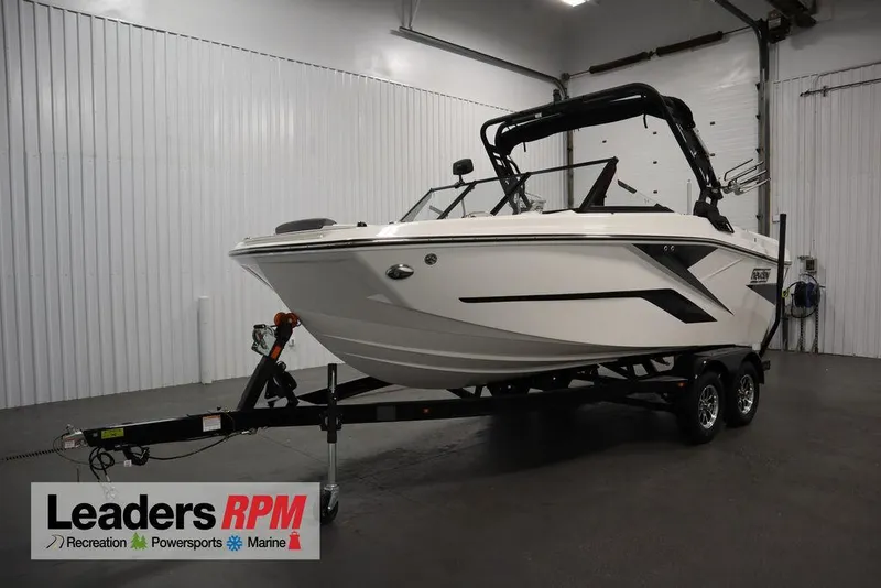 Slide: The Image of 2024 Heyday H20 boat on trailer in indoor showroom. - 1