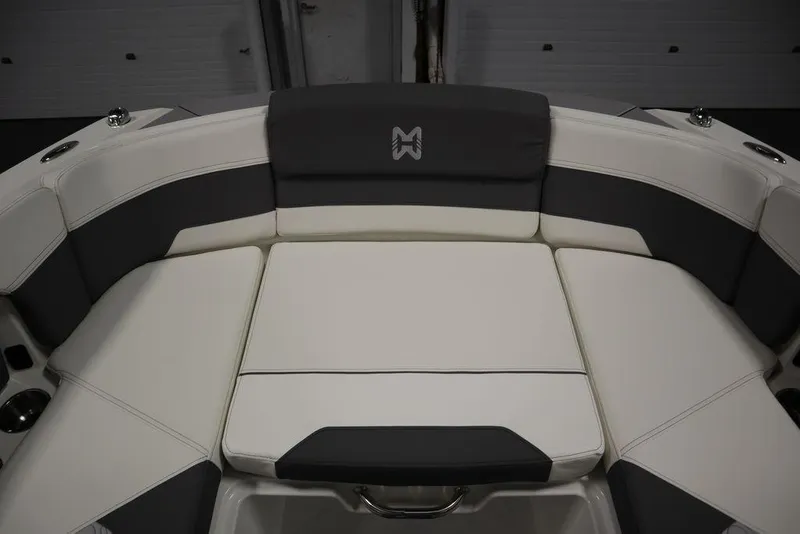 Slide: The Image of 2024 Heyday H20 boat interior with cushioned seating in white and gray. - 11