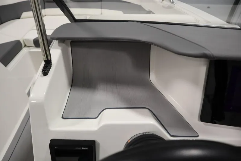 Slide: The Image of 2024 Heyday H20 boat interior dashboard with sleek, modern design and gray accents. - 20
