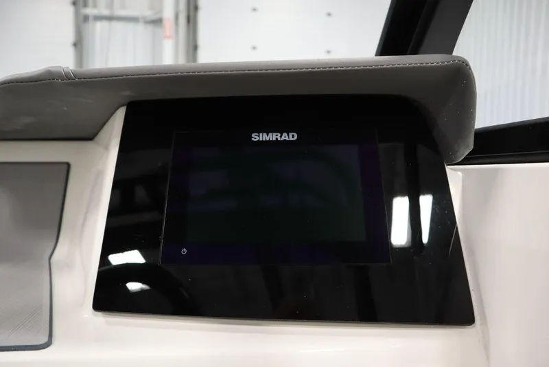 Slide: The Image of Simrad display on 2024 Heyday H20 boat dashboard, featuring sleek design and modern technology. - 24