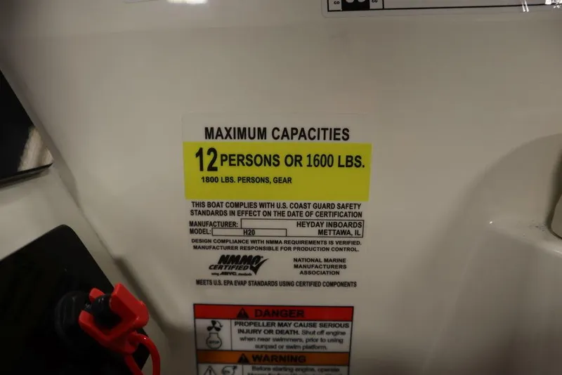 Slide: The Image of 2024 Heyday H20 boat capacity label: 12 persons or 1600 lbs maximum. - 27