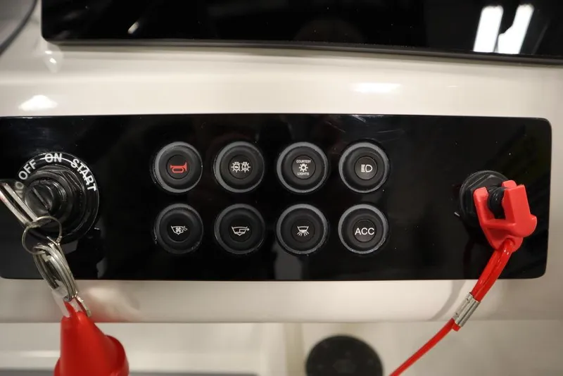 Slide: The Image of Control panel of 2024 Heyday H20 boat with ignition and accessory switches. - 28