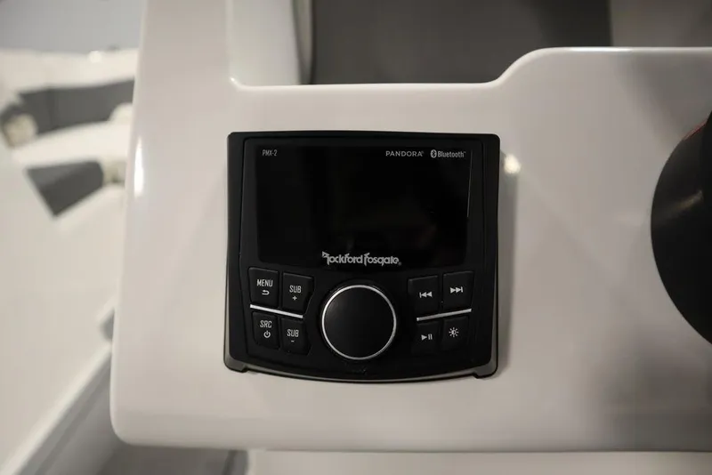 Slide: The Image of 2024 Heyday H20 boat stereo system with Rockford Fosgate controls, featuring Bluetooth and Pandora connectivity. - 30