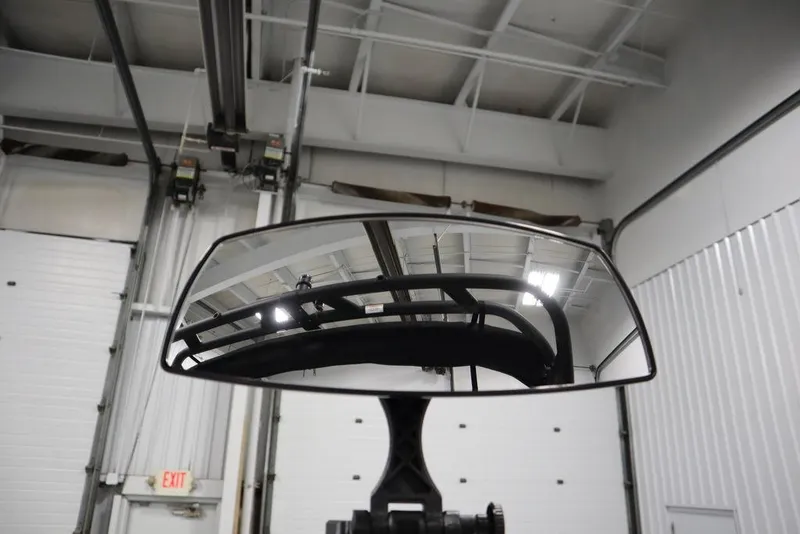 Slide: The Image of 2024 Heyday H20 rearview mirror in a garage setting, reflecting ceiling and lights. - 31
