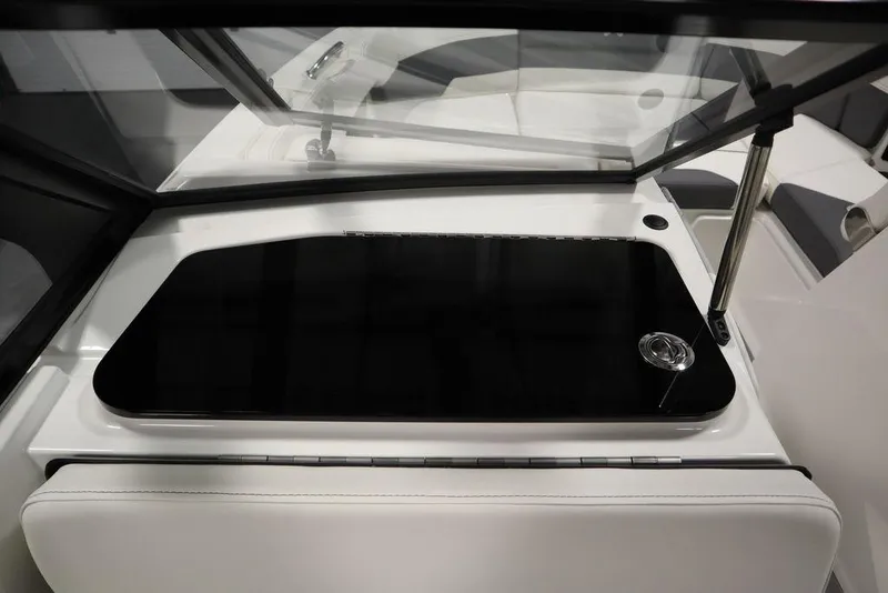 Slide: The Image of 2024 Heyday H20 boat interior with sleek black dashboard and modern design. - 35