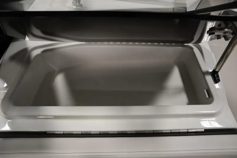 Slide: The Image of 2024 Heyday H20 boat storage compartment with open lid, showcasing spacious interior design. - 38