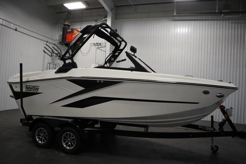 Slide: The Image of 2024 Heyday H20 boat on trailer in indoor storage facility. - 4