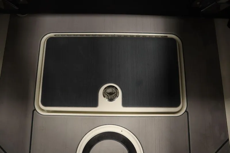 Slide: The Image of 2024 Heyday H20 boat interior with sleek black and gray flooring design. - 44