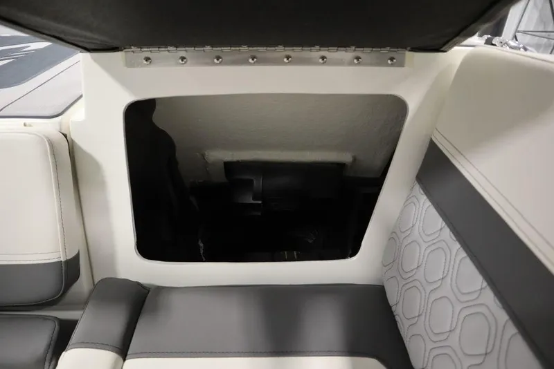 Slide: The Image of 2024 Heyday H20 boat interior storage compartment with cushioned seating. - 45