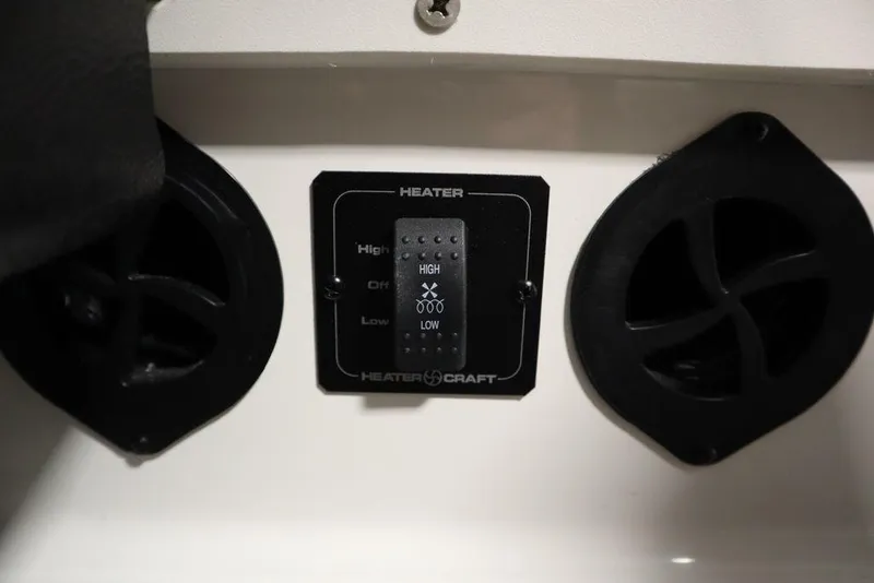 Slide: The Image of Heater control panel in 2024 Heyday H20 boat, featuring high and low settings. - 46