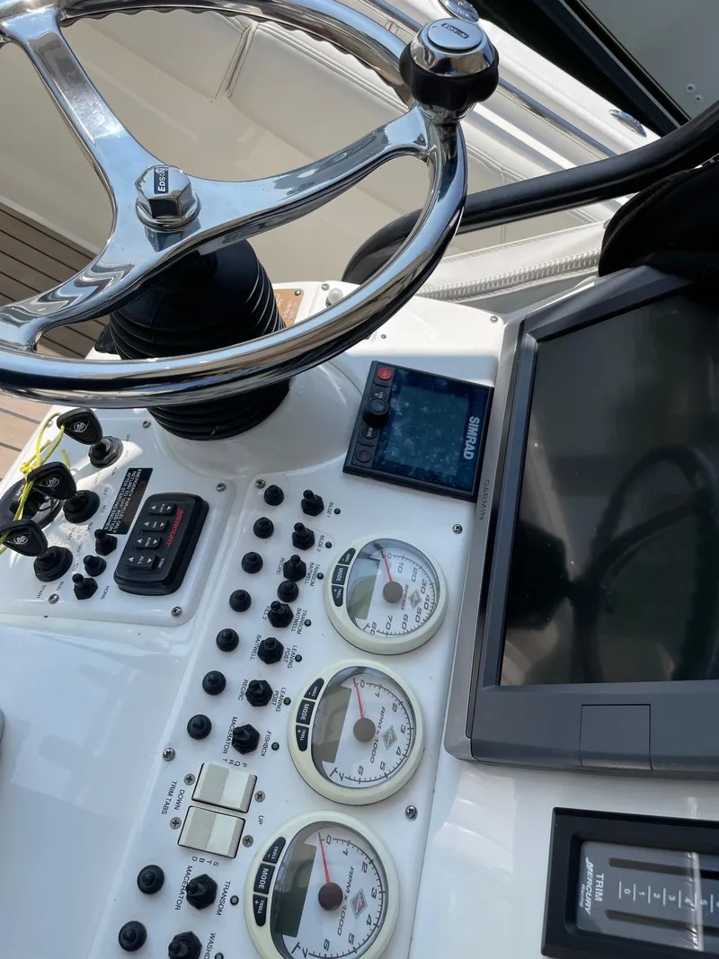 Slide: The Image of Helm Gauges and Garmin GPS - 5
