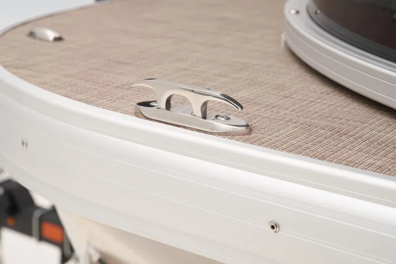 Slide: The Image of Close-up of 2024 Sun Tracker SportFish 22 DLX boat cleat on deck. - 16