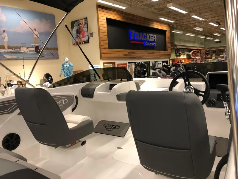 Slide: The Image of 2024 Tahoe T21 boat interior at Tracker Boats showroom. - 3