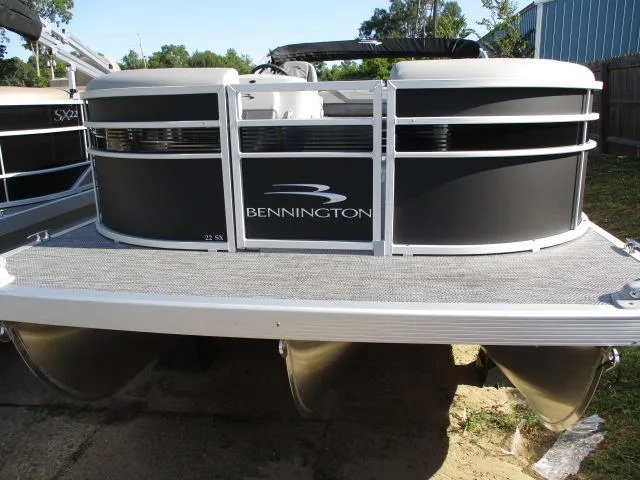 Slide: The Image of 2024 Bennington 22SXSB pontoon boat front view. - 10