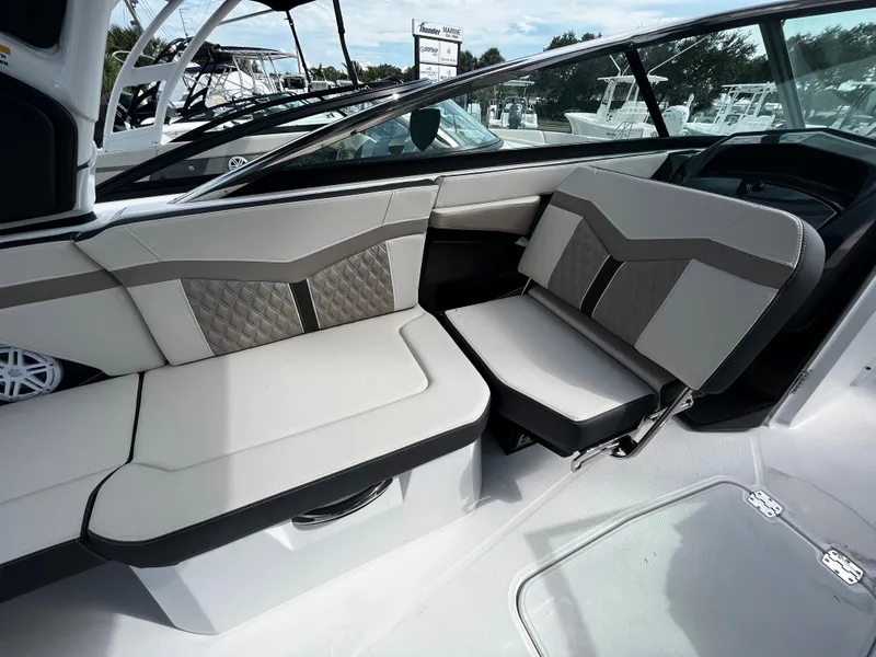 Slide: The Image of 2024 Monterey 275SS boat interior with stylish seating and modern design. - 10