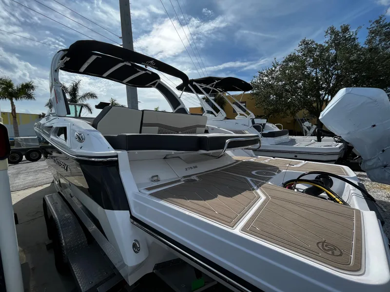 Slide: The Image of 2024 Monterey 275SS boat with sleek design and spacious deck. - 2