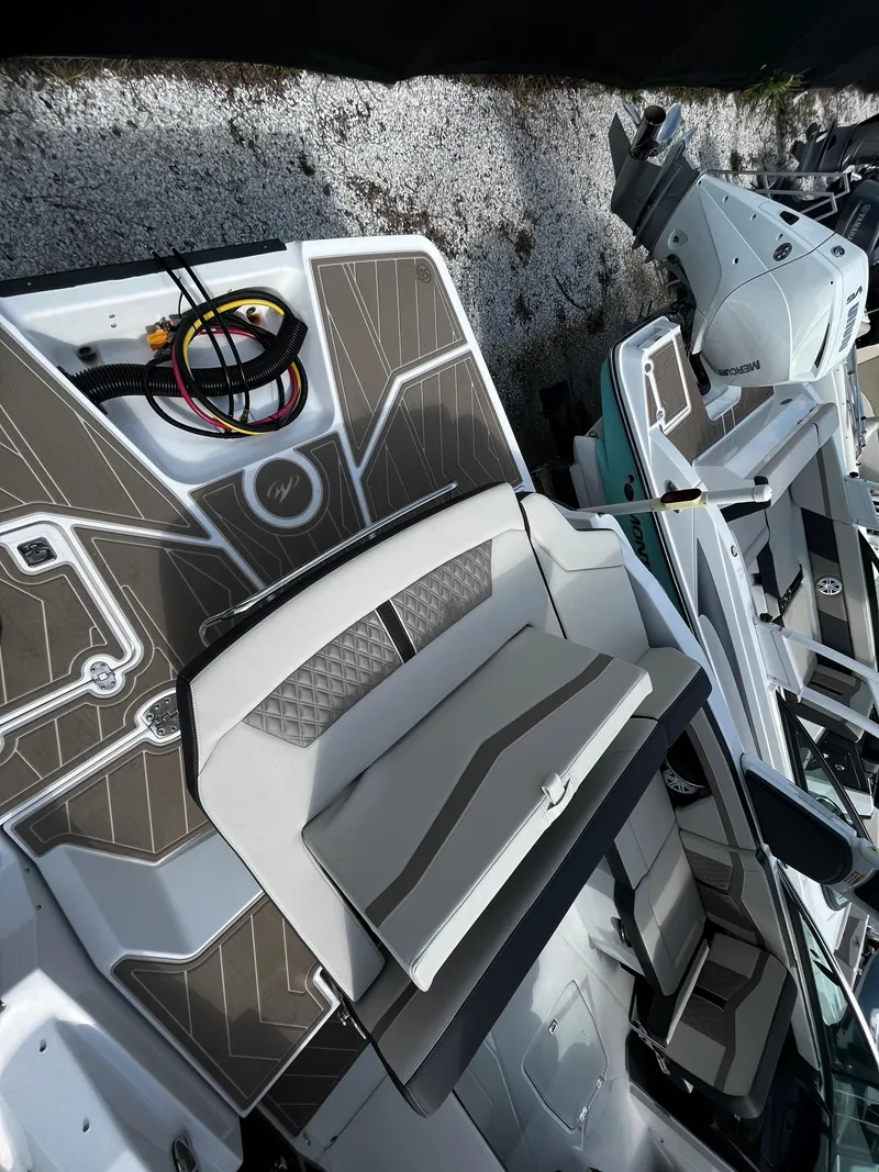 Slide: The Image of 2024 Monterey 275SS boat with modern seating and deck design. - 4