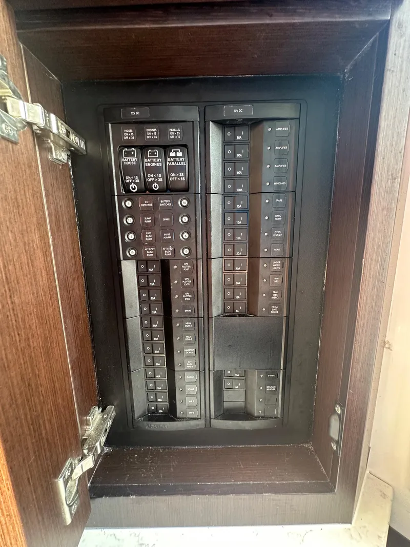Slide: The Image of Electrical panel inside a Jupiter 43 boat, 2024 model. - 30