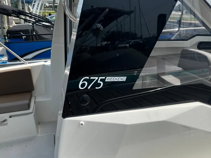 Slide: The Image of 2023 Quicksilver 675 Weekend Cruiser boat interior view. - 9