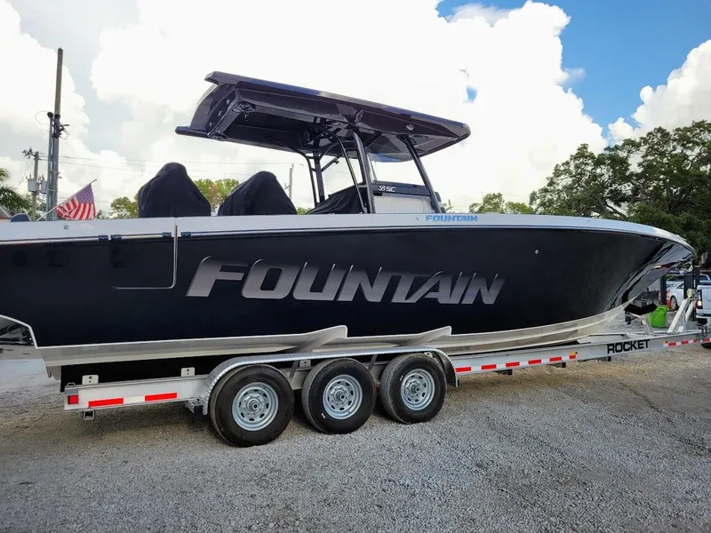 The Image of 2025 Fountain 38 SC boat on a trailer, side view. - 0