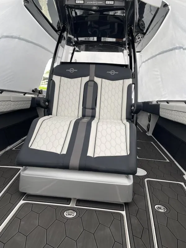Slide: The Image of 2025 Fountain 38 SC boat interior with dual seats and modern design. - 22