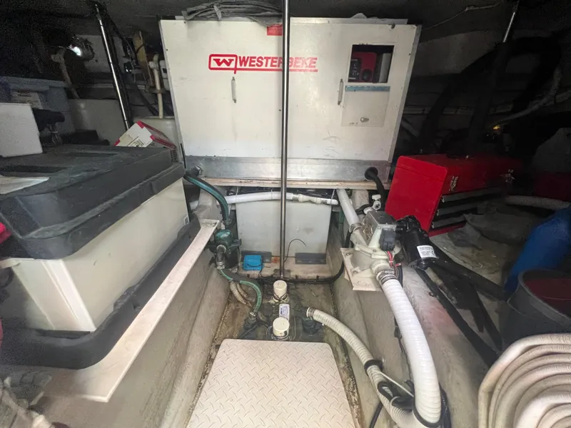 Slide: The Image of Engine room of a 2000 Sea Ray 540 Sundancer with Westerbeke generator. - 19