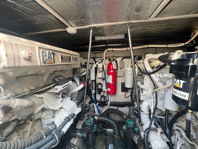 Slide: The Image of Engine room of a 2000 Sea Ray 540 Sundancer with CAT Marine Power engines. - 25