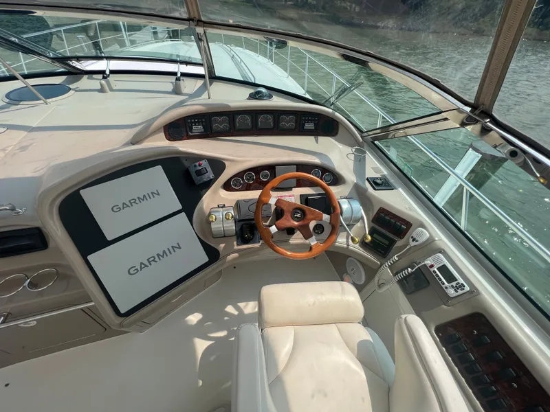 Slide: The Image of Helm of 2000 Sea Ray 540 Sundancer with Garmin navigation system. - 29