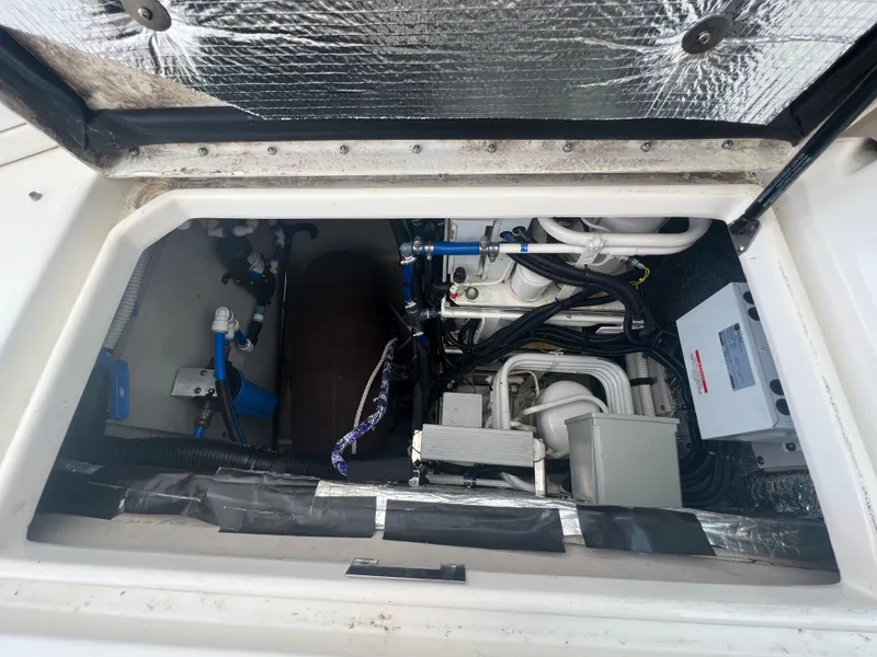 Slide: The Image of Engine compartment of a 2000 Sea Ray 540 Sundancer yacht. - 35
