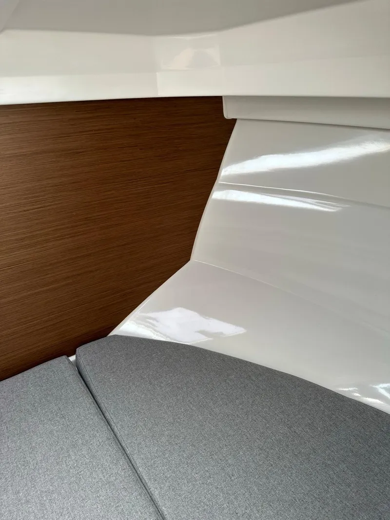 Slide: The Image of Interior cabin of 2020 Beneteau Antares 8 OB with modern design and comfortable seating. - 18