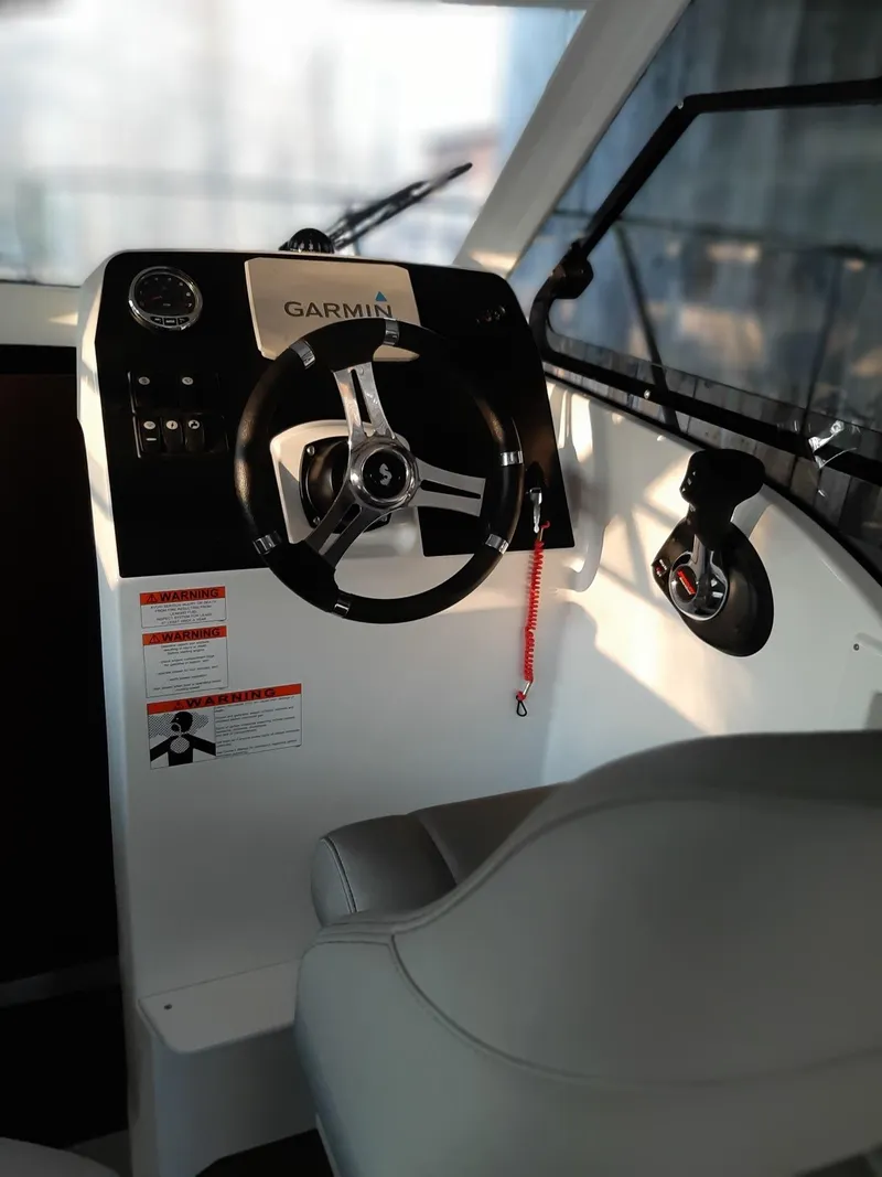 Slide: The Image of 2020 Beneteau Antares 8 OB helm with Garmin navigation system. - 6