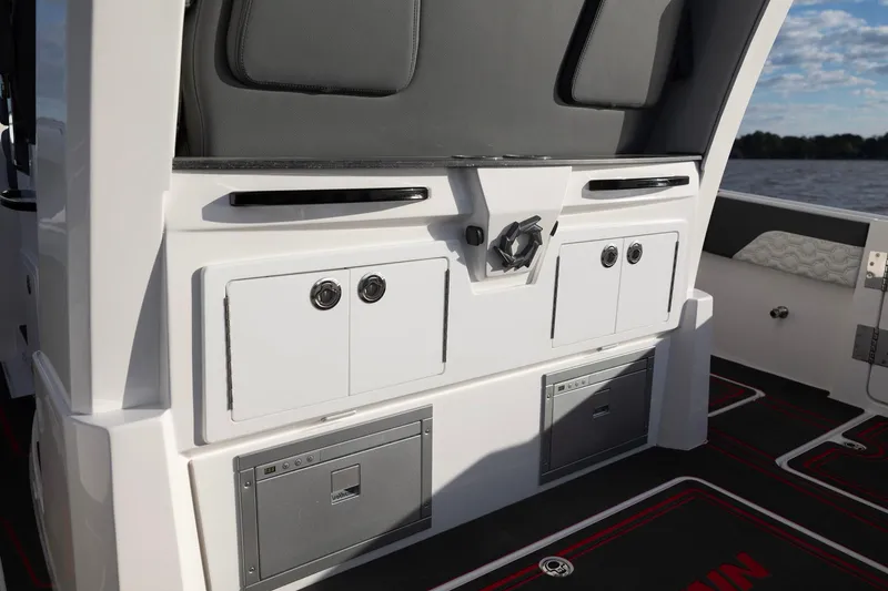 Slide: The Image of Fountain 43 SCX 2025 boat interior with storage compartments and seating. - 14