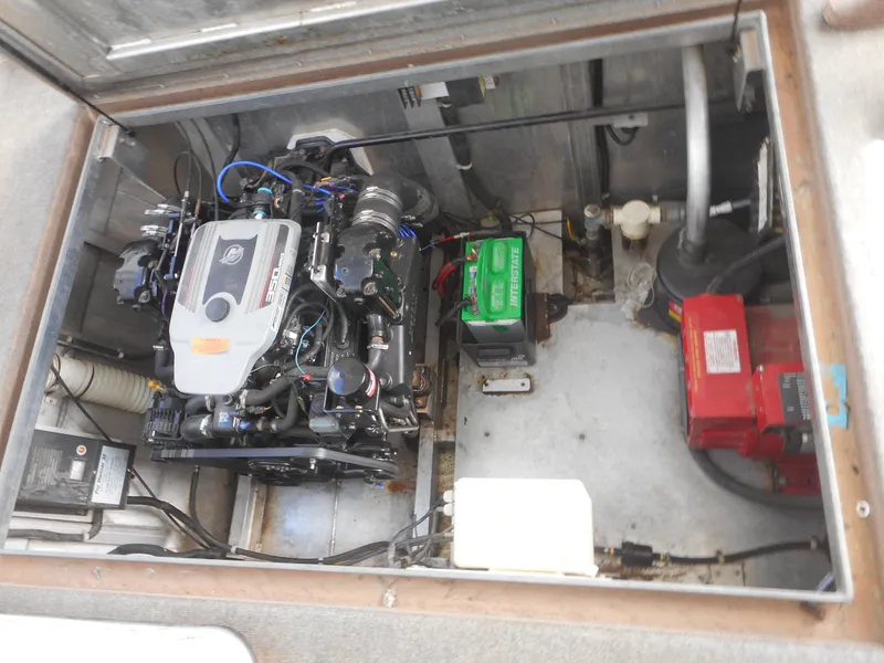 Slide: The Image of Engine compartment of a 1995 Stardust Cruisers The Verdict houseboat. - 2
