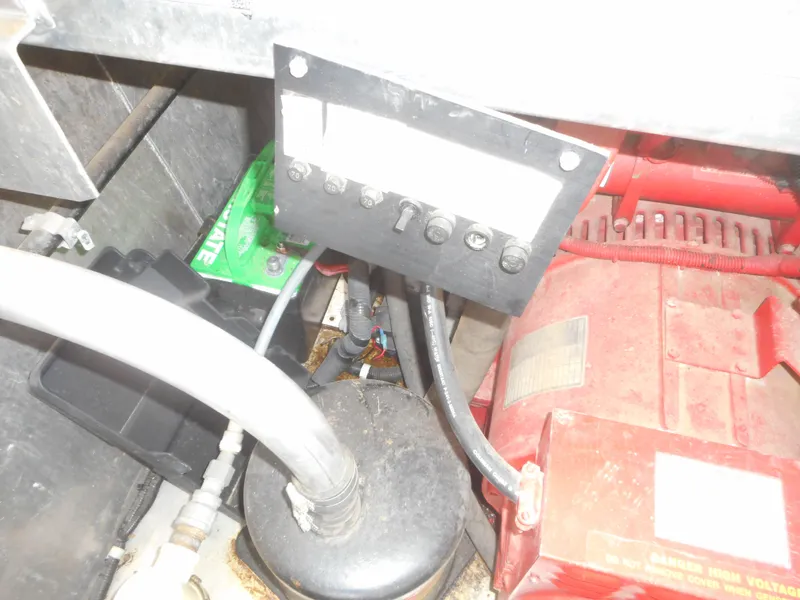 Slide: The Image of Control panel and engine components of 1995 Stardust Cruisers The Verdict houseboat. - 3