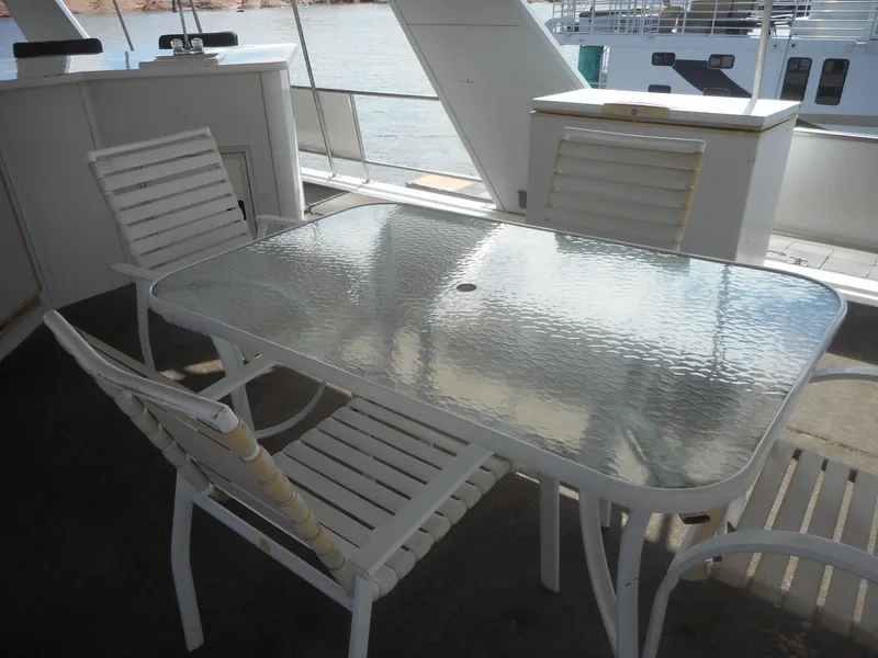 Slide: The Image of Outdoor dining area on 1995 Stardust Cruisers The Verdict houseboat. - 43