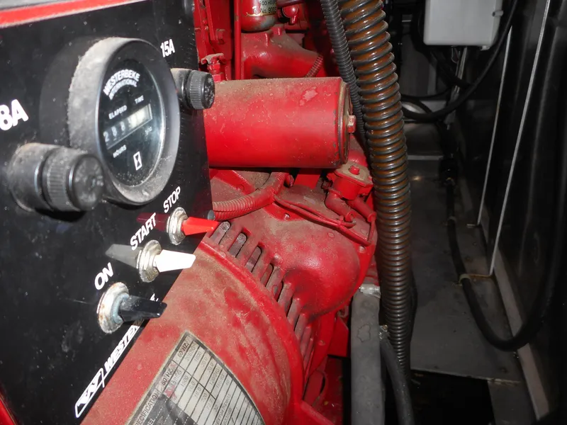 Slide: The Image of Close-up of engine controls on a 1995 Stardust Cruisers The Verdict boat. - 5