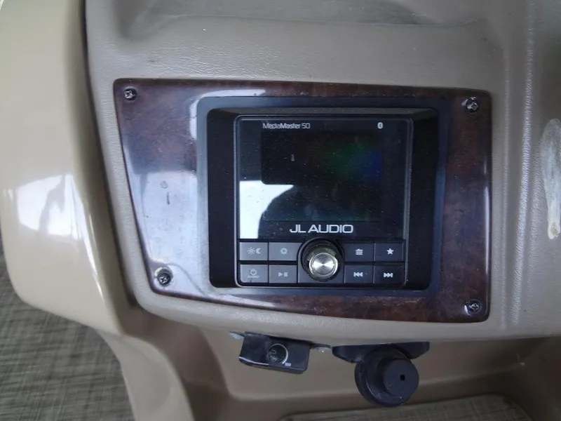 Slide: The Image of 2019 Lowe Retreat 230 RFL boat audio system with JL Audio MediaMaster 50. - 16
