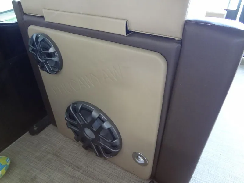 Slide: The Image of 2019 Lowe Retreat 230 RFL boat interior with built-in speakers. - 21