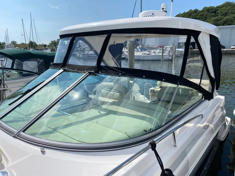 Slide: The Image of Interior of 2019 Regal 33 Express yacht with kitchenette and seating area. - 3