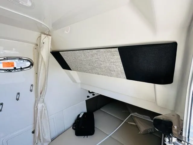 Slide: The Image of Interior cabin of 2023 Boston Whaler 360 Outrage boat with modern design. - 27