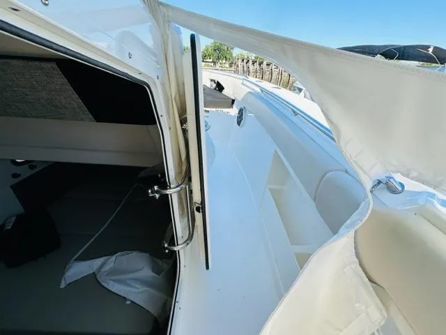 Slide: The Image of 2023 Boston Whaler 360 Outrage cabin and deck view. - 32