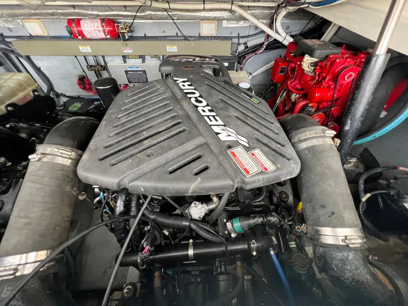 Slide: The Image of Engine compartment of a 2001 Sea Ray 340 Amberjack with a MerCruiser engine. - 27