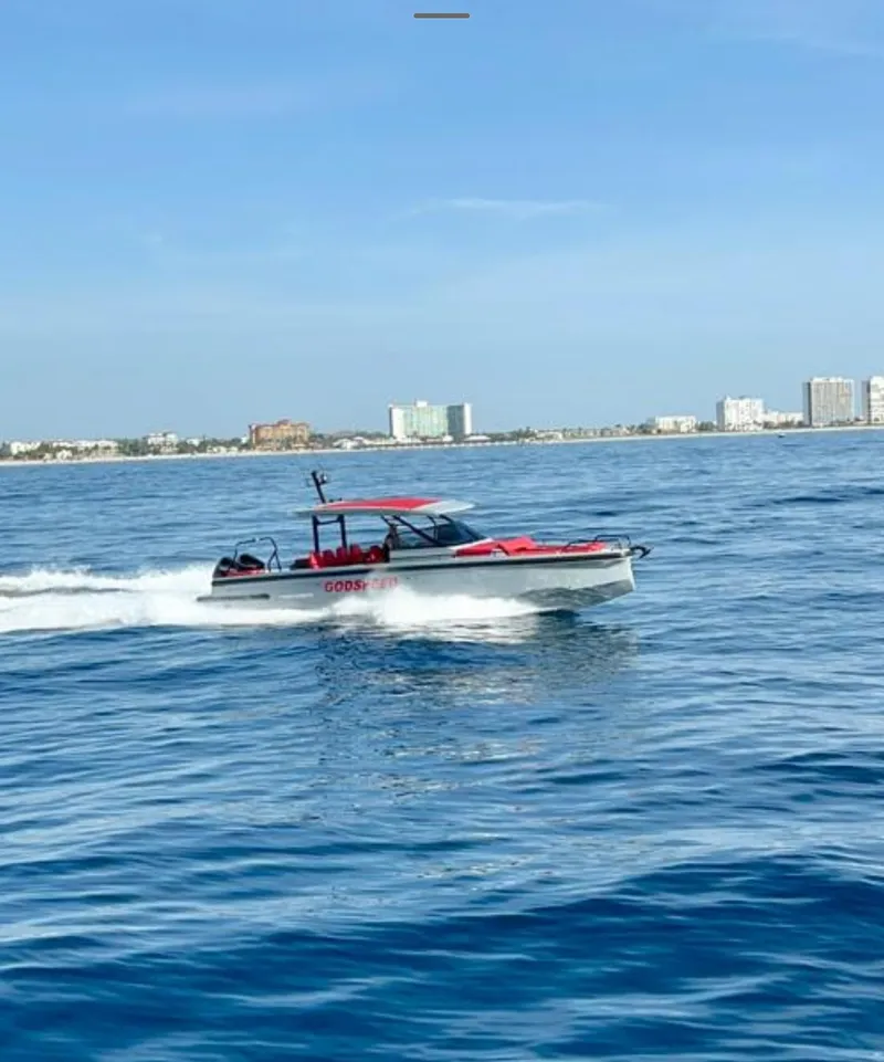 Slide: The Image of 2022 BRABUS Shadow 900 ST speedboat cruising on open water. - 16