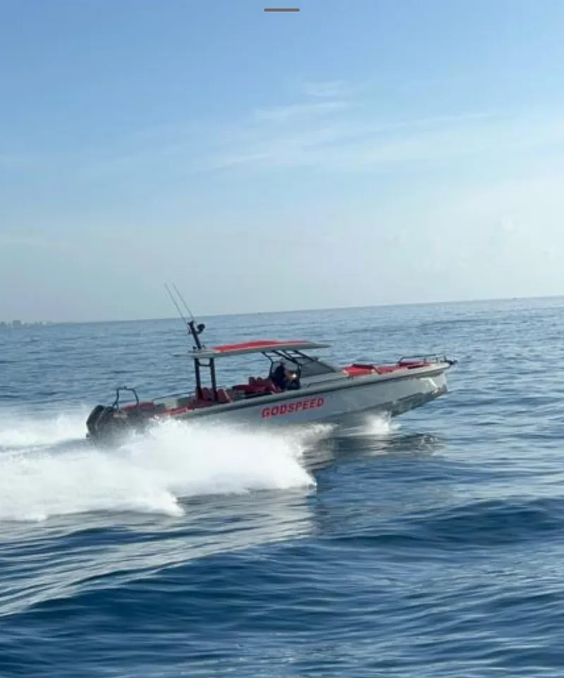 Slide: The Image of 2022 BRABUS Shadow 900 ST speedboat cruising on open water. - 17