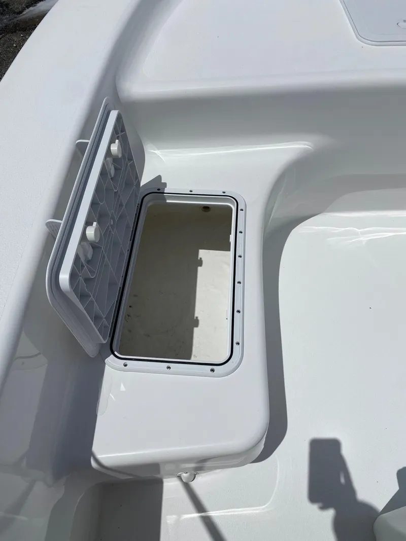 Slide: The Image of 2024 Savannah SS19 boat storage compartment with open hatch. - 15