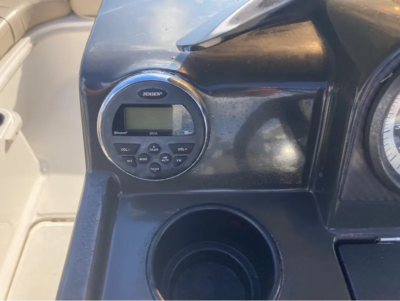 Slide: The Image of Jensen M53A stereo system on 2017 Bayliner 190 boat dashboard. - 9