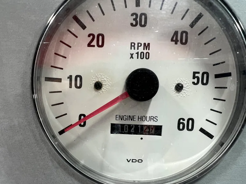 Slide: The Image of 1999 Formula 330 SS Sun Sport tachometer showing 1021.2 engine hours. - 12